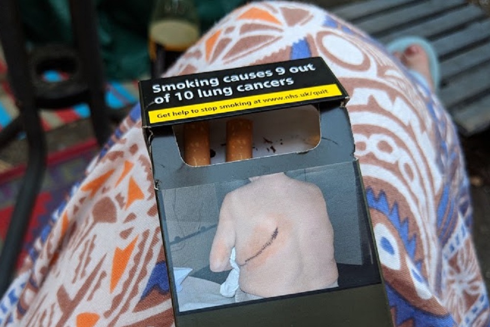Packet of cigarettes with warning