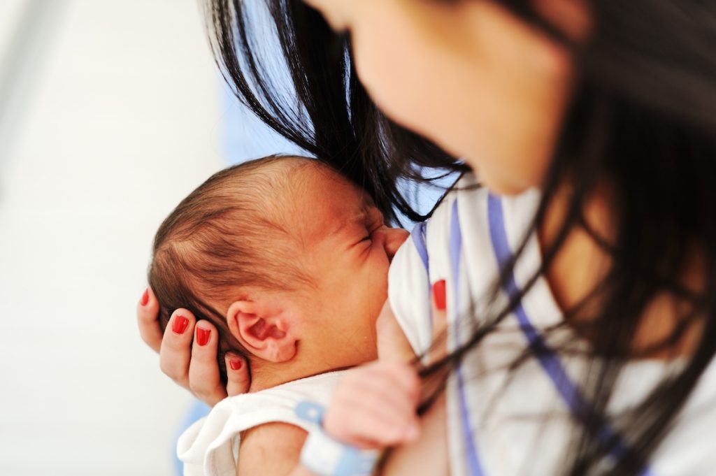 Mother Breastfeeding her newborn baby